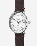 popup|Curved dial|The silvery satin-finished dial with fine curvature gives the model a noble vintage character.